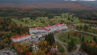 AX150_206E - 5.5K aerial stock footage orbiting Omni Mount Washington Resort, Bretton Woods, autumn, Carroll, New Hampshire