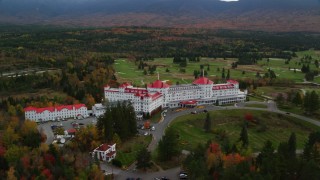AX150_207 - 5.5K aerial stock footage of Omni Mount Washington Resort, Bretton Woods, Mount Washington Resort Golf Club, Carroll, New Hampshire