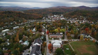 AX150_361 - 5.5K aerial stock footage flying by Vermont College of Fine Arts, homes, autumn, Montpelier, Vermont