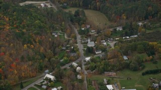 AX151_044E - 5.5K aerial stock footage flying by Skunk Hollow Road, Mace Hill Road, autumn, Hartland, Vermont