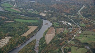 AX151_046 - 5.5K aerial stock footage flying by farms along the Connecticut River, autumn, Hartland, Vermont