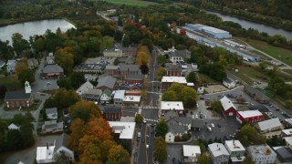 AX151_062 - 5.5K aerial stock footage flying over small rural town, main street, autumn, Windsor, Vermont