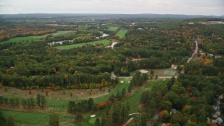 AX151_154 - 5.5K aerial stock footage flying over Beaver Meadow Golf Course, autumn, overcast, Concord, New Hampshire