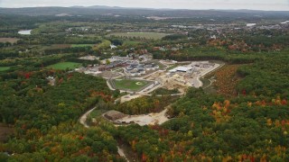 AX151_170E - 5.5K aerial stock footage approaching the New Hampshire State Prison, autumn, Concord, New Hampshire