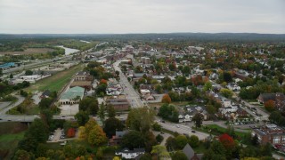 AX151_179 - 5.5K stock footage aerial video flying over Main Street, approaching downtown, autumn, Concord, New Hampshire