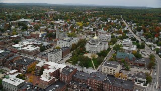 AX151_181 - 5.5K aerial stock footage orbiting St Paul's Church, New Hampshire State House, downtown, autumn, Concord, New Hampshire 