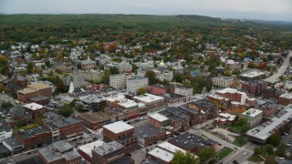 AX151_182 - 5.5K stock footage aerial video orbiting New Hampshire State House, Main Street, downtown, autumn, Concord, New Hampshire