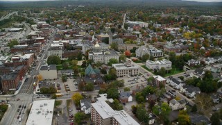 AX151_186 - 5.5K aerial stock footage orbiting downtown, New Hampshire State House, autumn, overcast, Concord, New Hampshire 