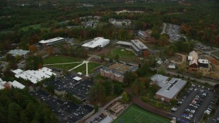 AX152_034 - 5.5K aerial stock footage  flying by Southern New Hampshire University, autumn, Hooksett, New Hampshire