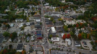 AX152_058 - 5.5K aerial stock footage flying by Broadway, downtown in autumn, Derry, New Hampshire
