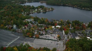 AX152_071 - 5.5K aerial stock footage orbiting Canobie Lake Park, autumn, Salem, New Hampshire