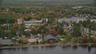 AX152_074E - 5.5K aerial stock footage circling the waterfront Canoe Lake Park, autumn, Canobie Lake Park, Salem, New Hampshire