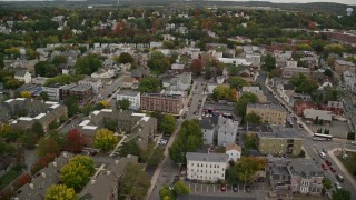 AX152_109 - 5.5K aerial stock footage flying over town streets and apartment buildings, autumn, Lawrence, Massachusetts