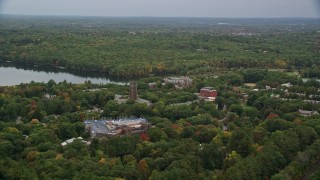 AX152_179 - 5.5K stock footage aerial video flying by Green Hall, colorful foliage in autumn, Wellesley College, Massachusetts