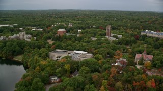 AX152_181 - 5.5K aerial stock footage orbiting Green Hall and Tower Court, autumn, Wellesley College, Massachusetts