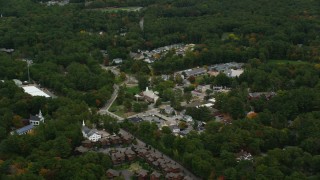 AX152_189 - 5.5K aerial stock footage flying by Dover City Hall, small town in autumn, Dover, Massachusetts