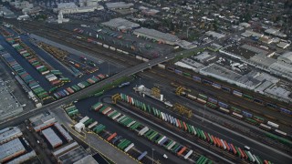 AX153_017 - 5.5K aerial stock footage of a bird's eye of shipping containers at a train depot, Portland, OR