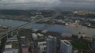 AX153_041 - 5.5K stock footage aerial video flying along Interstate 405 and Fremont Bridge, Downtown Portland, Oregon