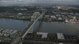 AX153_041E - 5.5K aerial stock footage approach and orbit top of Fremont Bridge revealing Downtown Portland, Oregon