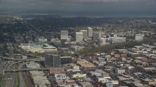AX153_091 - 5.5K stock footage aerial video of Oregon Convention Center and office buildings in Lloyd District of Portland, Oregon