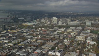 AX153_102 - 5.5K stock footage aerial video of Oregon Convention Center and office buildings in Lloyd District, Portland, Oregon