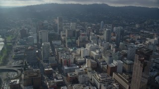 AX153_124 - 5.5K aerial stock footage approaching Wells Fargo Center and skyscrapers in Downtown Portland, Oregon