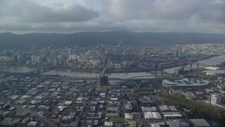 AX153_129 - 5.5K stock footage aerial video of Downtown Portland and Willamette River seen from Lloyd District in Oregon