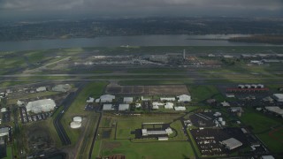 AX153_133 - 5.5K aerial stock footage approaching Portland International Airport and the Columbia River in Oregon