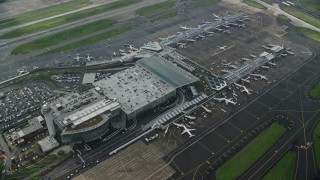 AX153_135E - 5.5K aerial stock footage of a bird's eye view of rooftop parking at Portland International Airport in Oregon