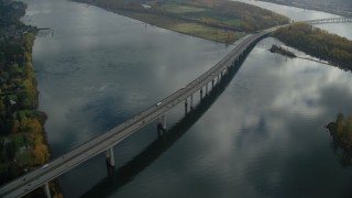 AX153_139 - 5.5K aerial stock footage of I-205 Bridge over the Columbia River in Vancouver, Washington