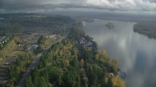 AX153_145 - 5.5K aerial stock footage approaching a lumber mill on the Columbia River near Highway 14, Camas and Vancouver, Washington