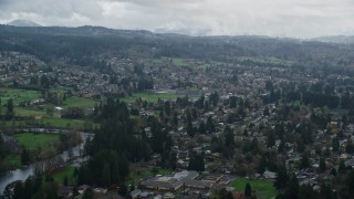AX153_163 - 5.5K aerial stock footage of small town suburban homes in Washougal, Washington