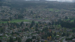 AX153_164 - 5.5K aerial stock footage of elementary and high schools in Washougal, Washington