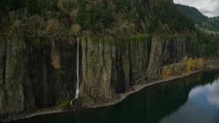 AX154_006E - 5.5K aerial stock footage revealing three waterfalls in Columbia River Gorge, Washington
