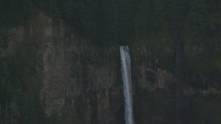 AX154_021 - 5.5K aerial stock footage flying away from Multnomah Falls on the Oregon side of Columbia River Gorge