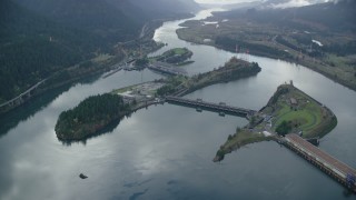 AX154_034 - 5.5K stock footage aerial video orbiting the Bonneville Dam in the Columbia River Gorge