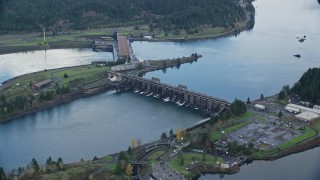 AX154_037E - 5.5K aerial stock footage of the Bonneville Dam in Columbia River Gorge