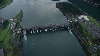 AX154_039E - 5.5K aerial stock footage approaching the Bonneville Dam in Columbia River Gorge
