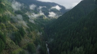 AX154_043 - 5.5K aerial stock footage flying through canyon to follow Eagle Creek Trail, Cascade Range, Hood River County, Oregon