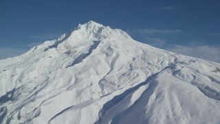 AX154_083 - 5.5K stock footage aerial video of Mount Hood slops covered in snow, Mount Hood, Cascade Range, Oregon