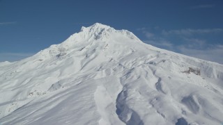 AX154_084 - 5.5K aerial stock footage of Mount Hood covered in snow, Mount Hood, Cascade Range, Oregon