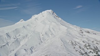 AX154_097 - 5.5K aerial stock footage of snow on the slopes of Mount Hood, Cascade Range, Oregon