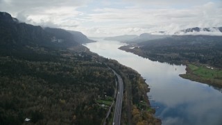 AX154_183 - 5.5K aerial stock footage following Interstate 84 through the Columbia River Gorge