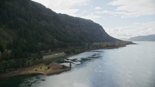 AX154_188 - 5.5K aerial stock footage approaching the I-84 highway in the Columbia River Gorge, on the Oregon side