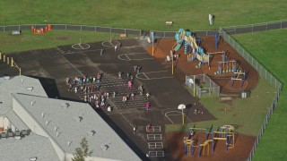 AX154_206 - 5.5K aerial stock footage orbiting the Gause Elementary playground in Washougal, Washington