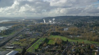 AX154_210 - 5.5K aerial stock footage approaching Washougal River and the Georgia Pacific Paper Mill in Camas, Washington