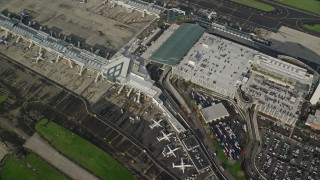AX154_223 - 5.5K aerial stock footage flying away from Portland International Airport, Oregon
