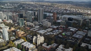 AX154_231E - 5.5K aerial stock footage orbiting skyscrapers in Downtown Portland, Oregon