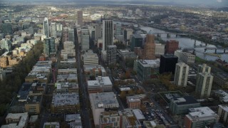 AX154_233 - 5.5K aerial stock footage orbiting Wells Fargo Center, KOIN Center and skyscrapers in Downtown Portland, Oregon