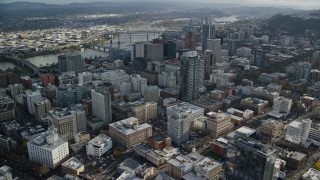 AX154_238E - 5.5K aerial stock footage orbiting skyscrapers and city streets near US Bancorp Tower in Downtown Portland, Oregon